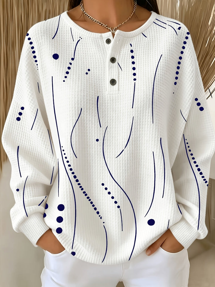Calira – haut à pois en tricot gaufré