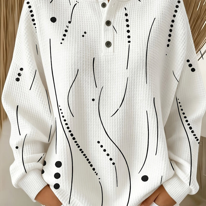 Calira – haut à pois en tricot gaufré