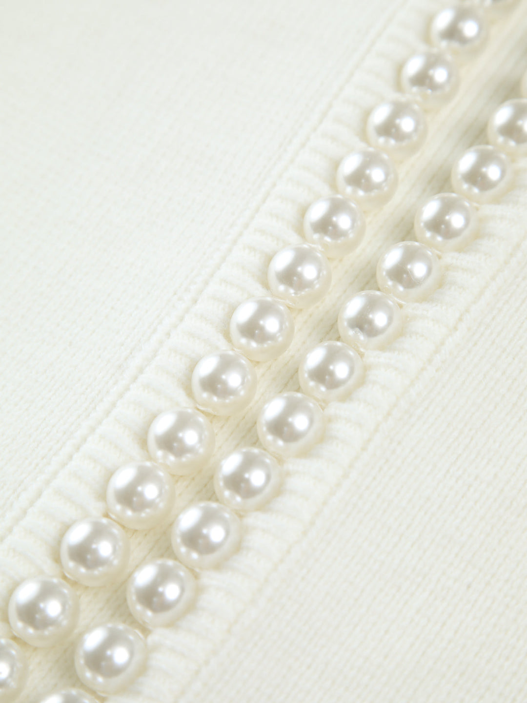 Virela – Détails en perles – maille – veste