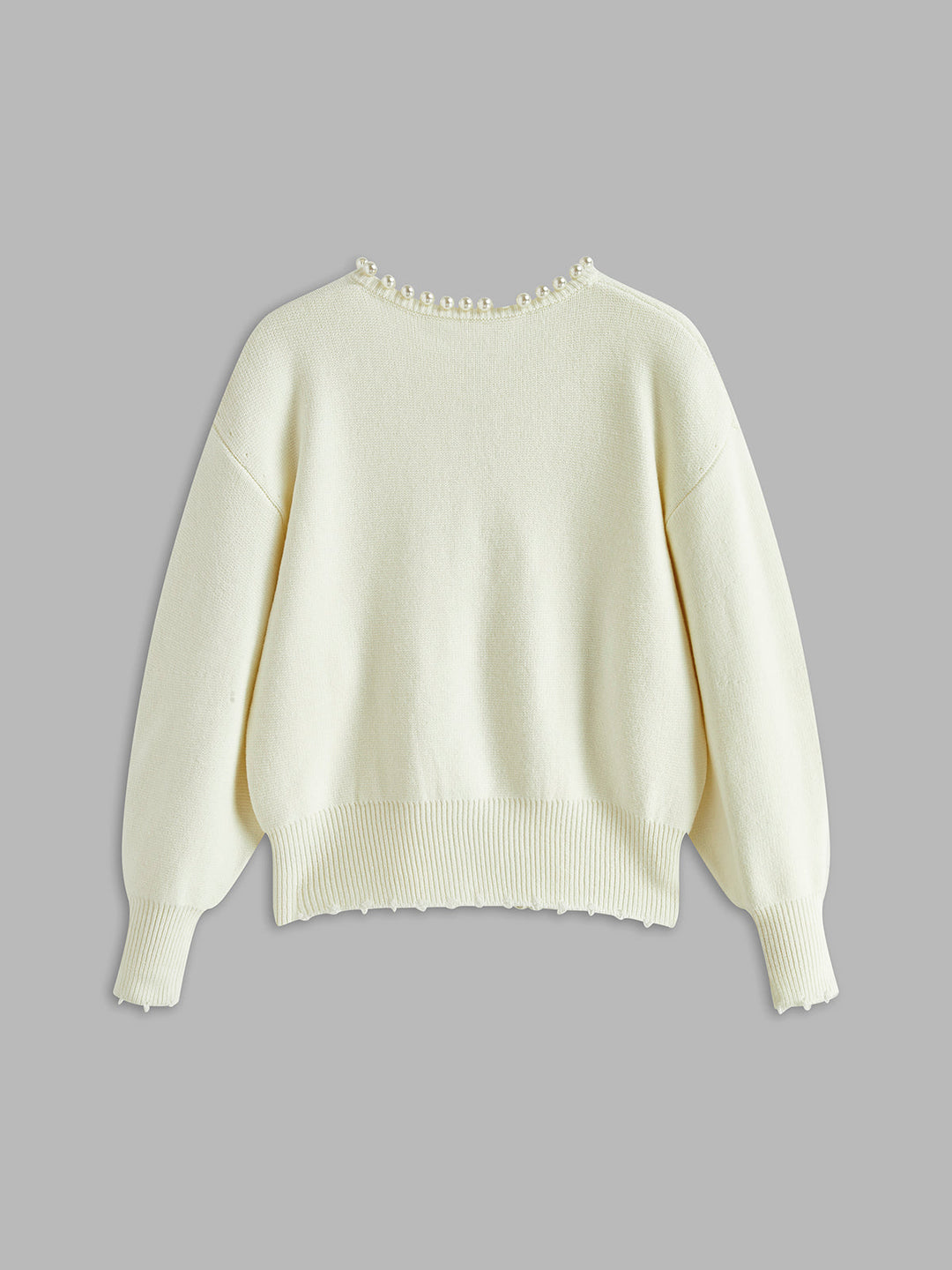 Virela – Détails en perles – maille – veste