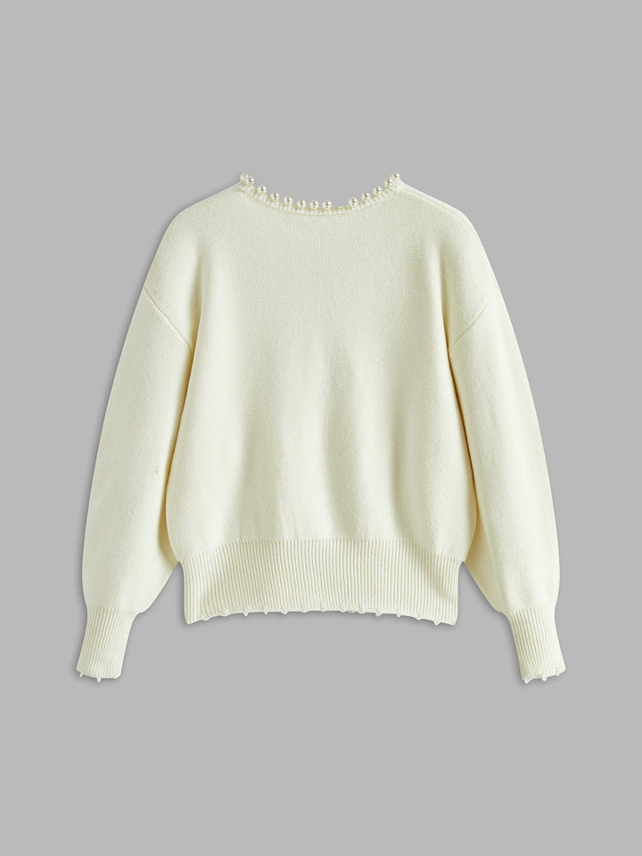 Virela – Détails en perles – maille – veste