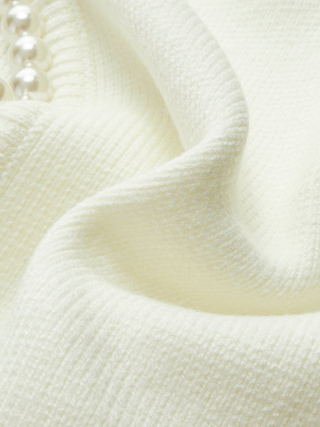 Virela – Détails en perles – maille – veste