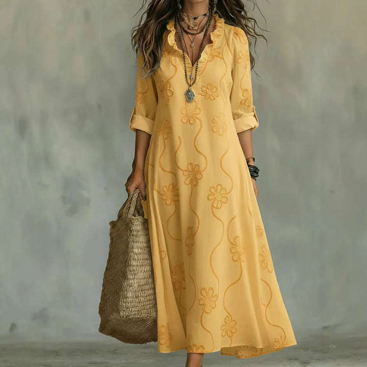 Talira – Manches roulées et motif floral, robe maxi