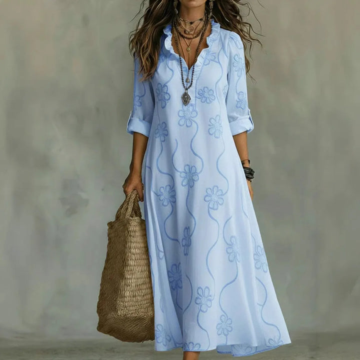 Talira – Manches roulées et motif floral, robe maxi