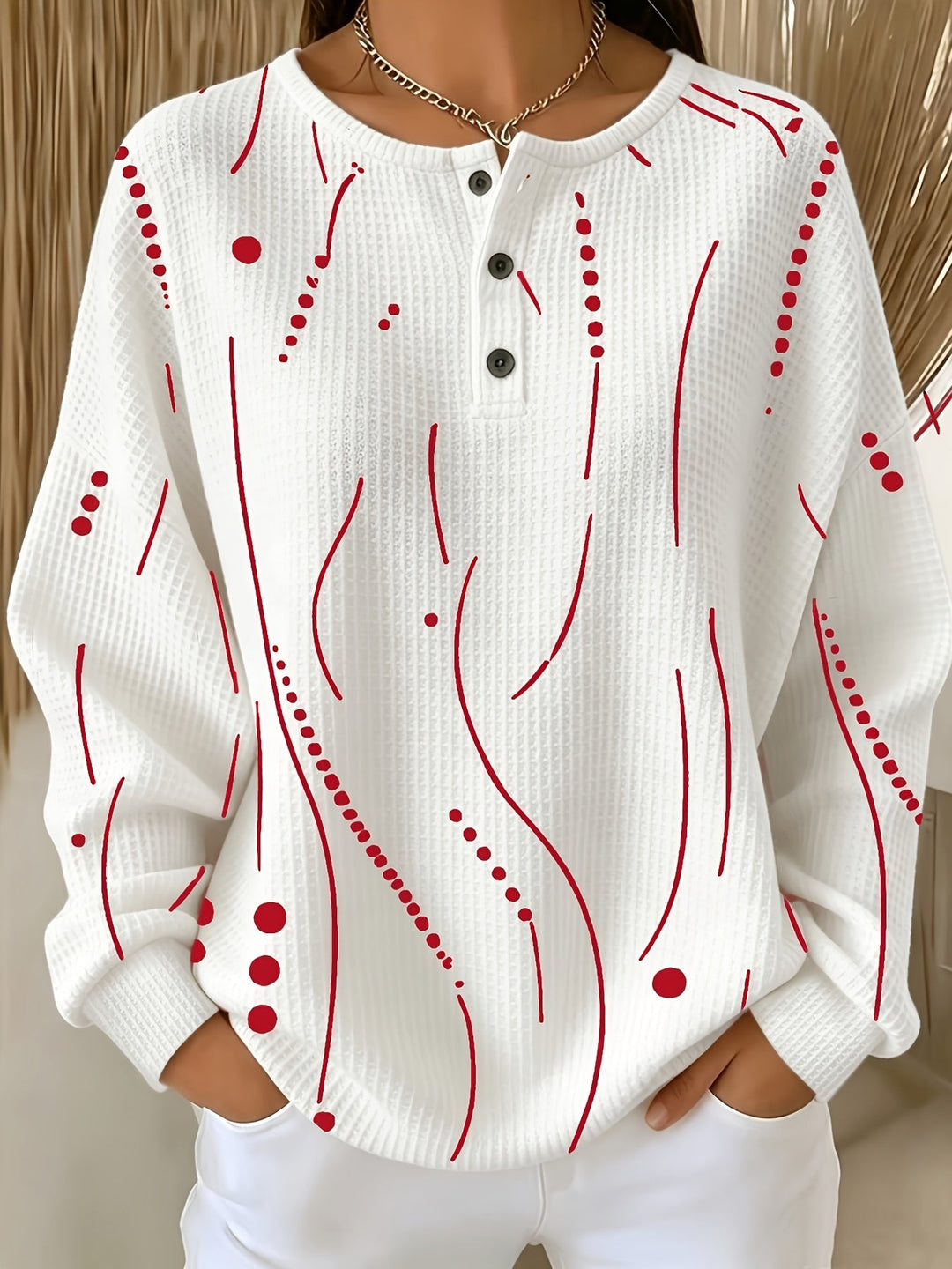 Calira – haut à pois en tricot gaufré