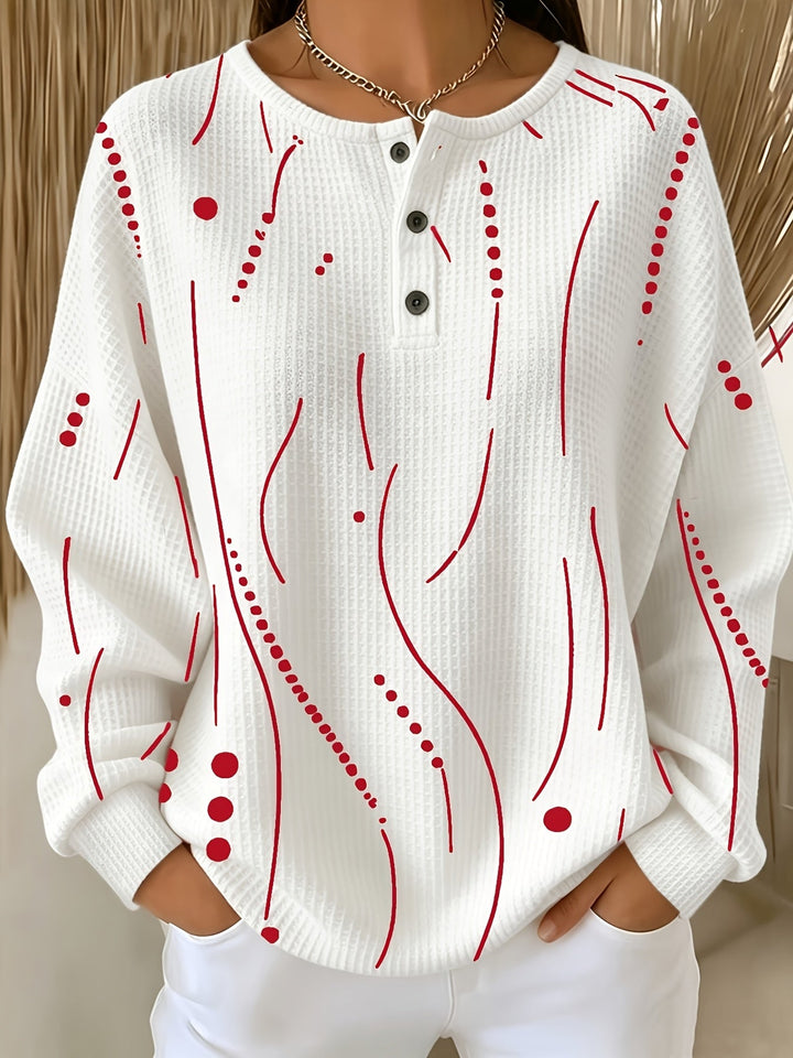Calira – haut à pois en tricot gaufré
