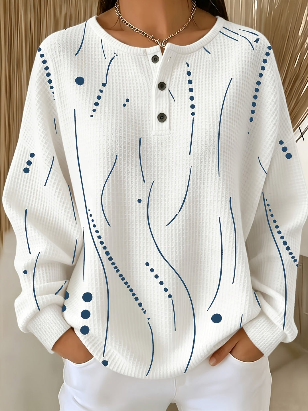 Calira – haut à pois en tricot gaufré